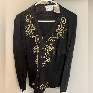 Ladies of black and gold sweater.